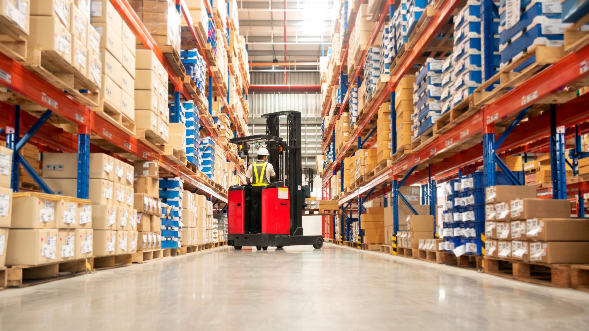 Warehouse Transformative Retail Storage Solutions streamlining success, as seen in this efficient warehouse operation with a forklift.