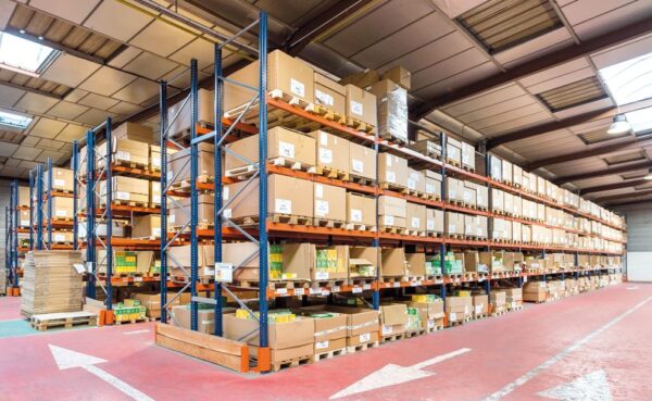 Warehouse See how effective Warehouse Design Services lead to Maximized Efficiency in this well-organized warehouse with Mecalux racking and clear pathways.