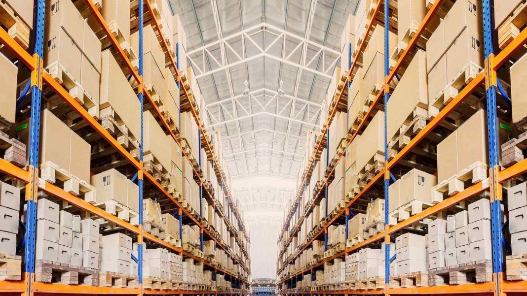 Warehouse This expansive and efficiently packed retail warehouse aisle illustrates The Road to Modernizing Storage Solutions for Efficiency and Profitability.