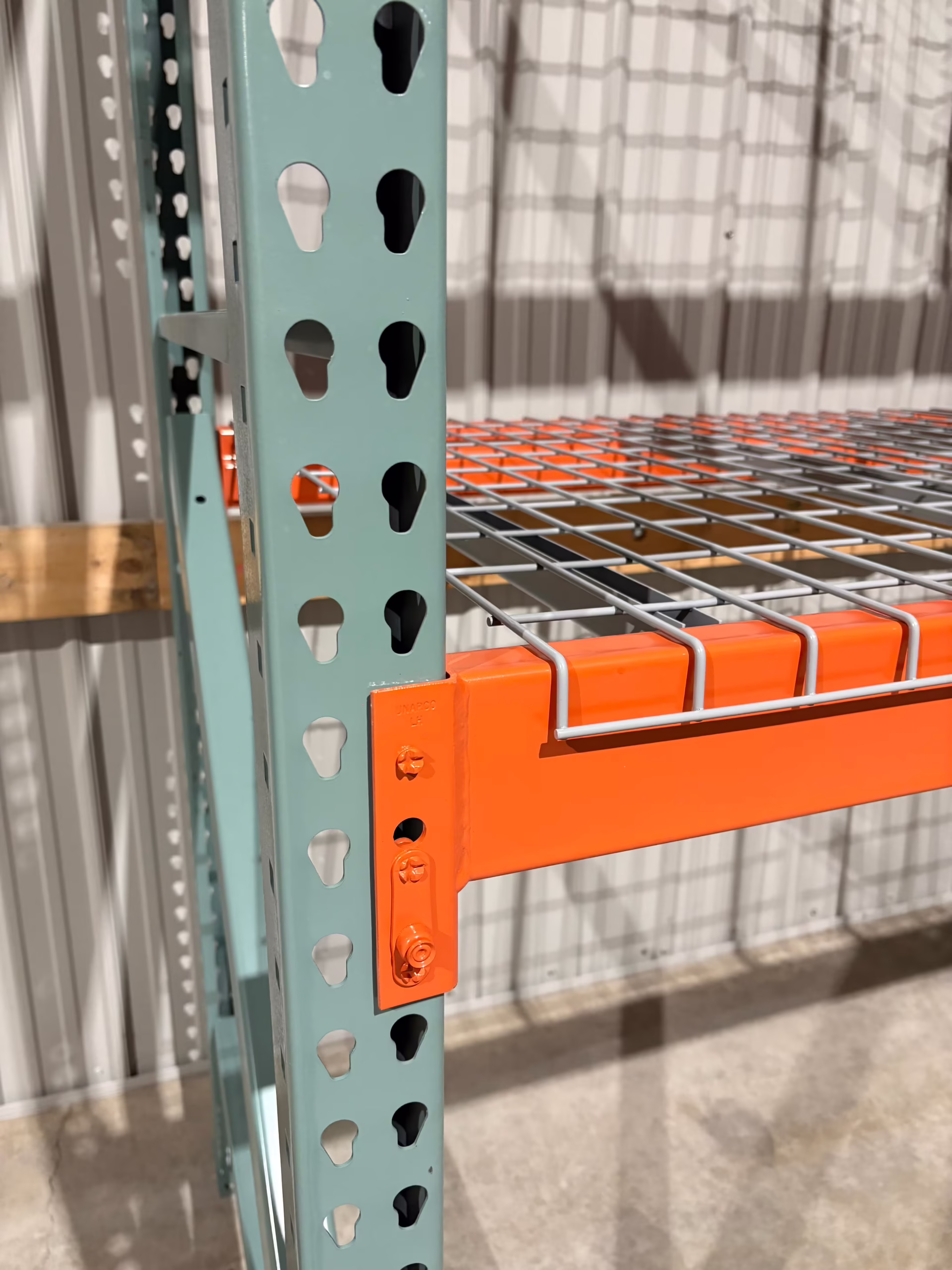 Selective pallet racking structure showing teardrop uprights and horizontal load beams