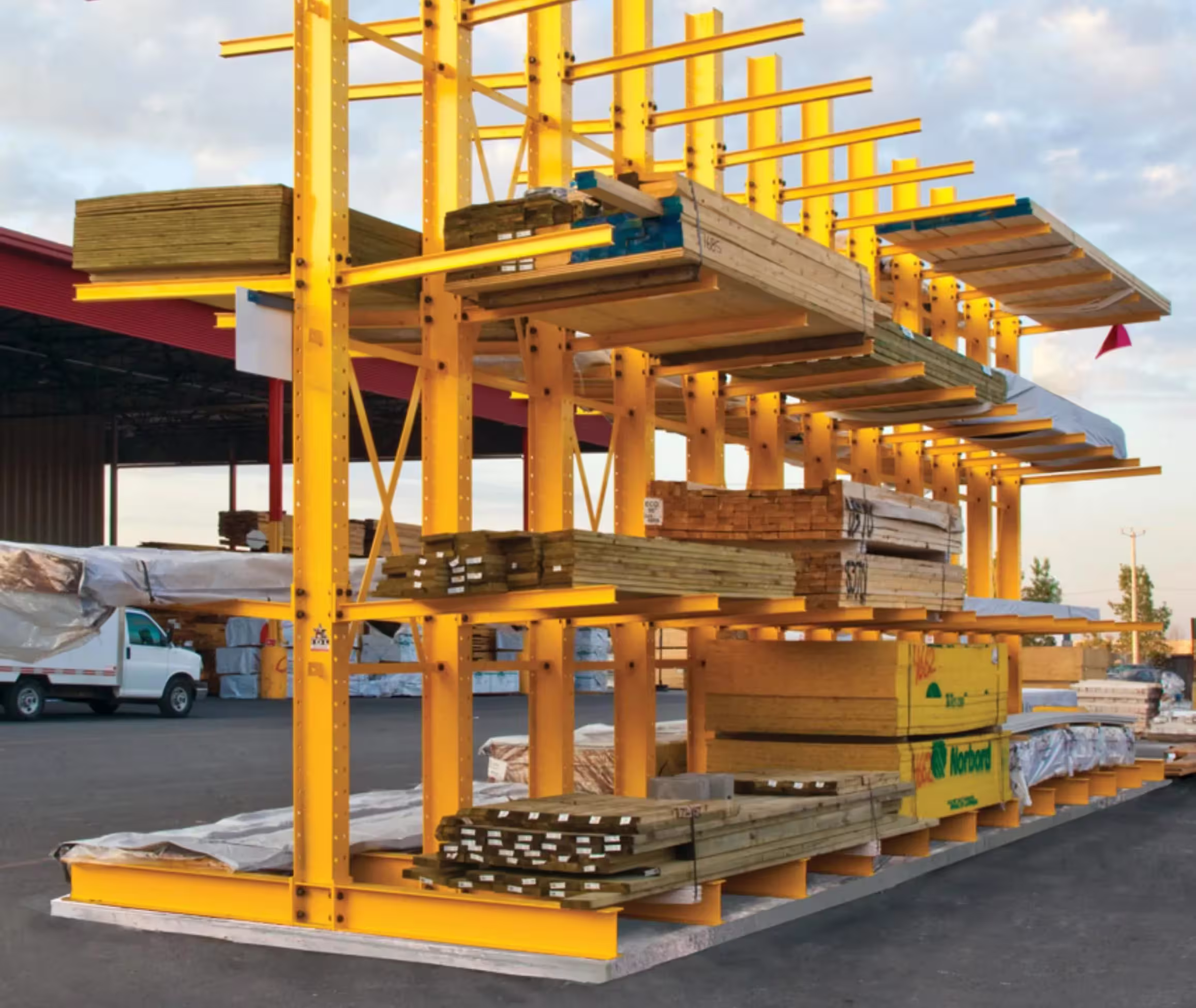 Warehouse workers using cantilever racking for efficient material handling and storage